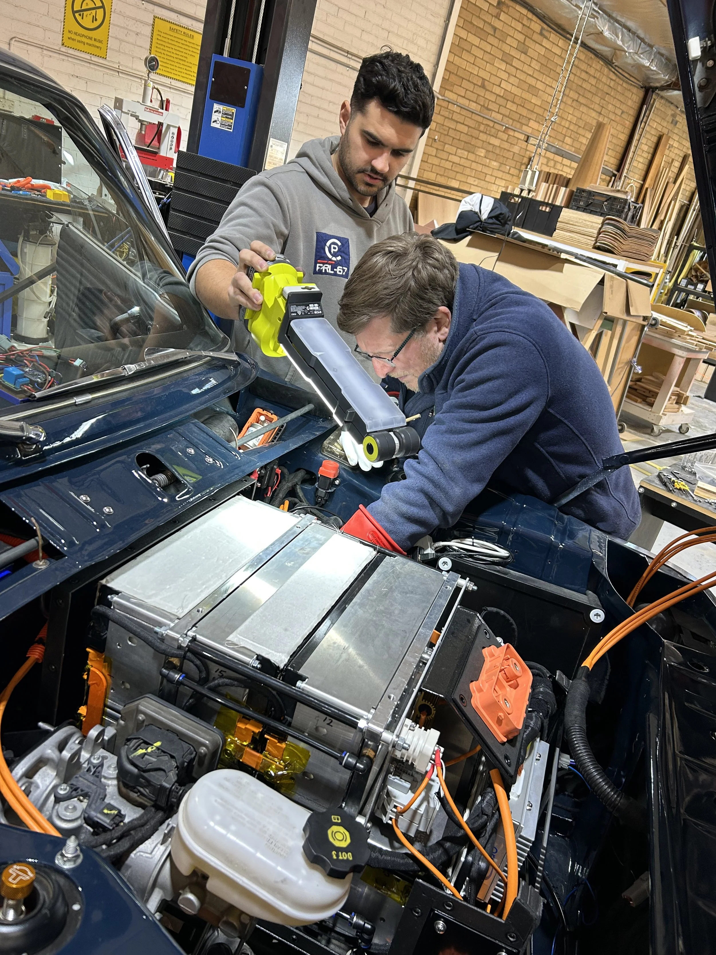 Swinburne University engineering students in the Revival EV workshop